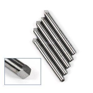 May include: Five silver-coloured, pointed, metal tools with a hexagonal tip. The tools are arranged in a fan shape, with the tips pointing towards the top of the image.