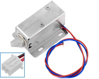 May include: A silver electric door lock with a red and blue wire connector. The lock has a metal latch and a white plastic connector.