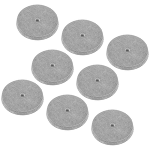 Puede incluir: Ocho ruedas de pulido de fieltro gris con un agujero central. Las ruedas están dispuestas en forma escalonada.