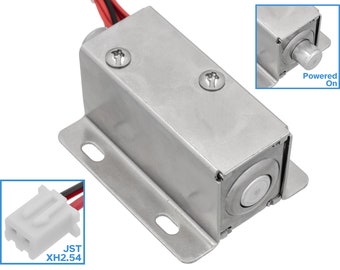 May include: A silver electric door lock with a white button and a JST XH2.54 connector. The lock is powered on and the button is depressed.