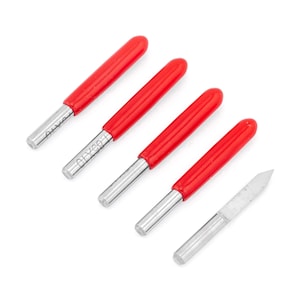 May include: Set of five carving tools with red handles and silver blades. The tools have different shapes and sizes. There is also a single silver blade with a pointed tip.