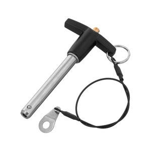 May include: A black and silver T-handle pin with a black cord and a small ring attached. The pin is designed for securing items together.