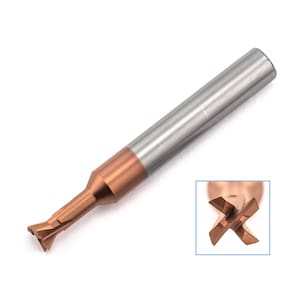 May include: A close-up of a brown and silver end mill with four cutting edges. The end mill is designed for machining metal.