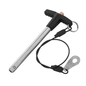 May include: A black and silver metal pin with a T-shaped handle and a black cord attached to a metal ring.