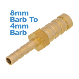 May include: Brass 8mm to 4mm barb hose connector. The connector is made of brass and has a hexagonal nut on one end and a barb on the other end.