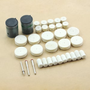 May include: A set of 30 white felt polishing wheels and 10 white felt polishing cylinders, along with three metal polishing mandrels. The polishing wheels and cylinders are used for polishing metal, wood, and other materials.