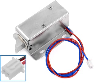 May include: A silver electric door lock with a red and blue wire connector. The lock has a metal latch and a rectangular shape.