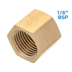 May include: A brass 1/8 inch BSP female threaded nut.
