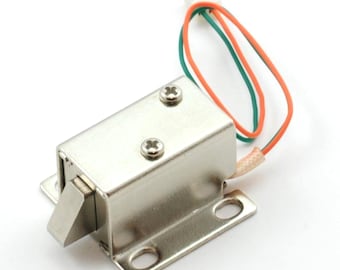 May include: A silver electric door lock with a metal latch and a three-wire connector. The wires are red, green, and white.