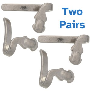 May include: Four silver-toned metal clasps arranged on a white background. Each clasp has a curved, hook-like design with a decorative end. The text "Two Pairs" is displayed in blue.