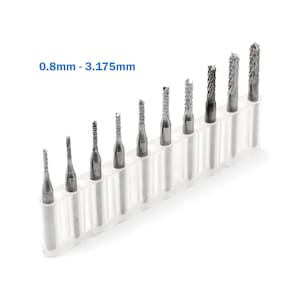 May include: A set of 10 silver-coloured end mills in a clear plastic holder. The end mills are arranged in order of size, with the smallest end mill on the left and the largest end mill on the right. The end mills are labelled with their sizes in millimetres: 0.8mm - 3.175mm.