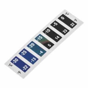 Op de afbeelding: Een witte temperatuurstrip met zwarte en gekleurde rechthoekige indicatoren. De strip toont temperatuurmetingen in zowel Celsius als Fahrenheit, vari&euml;rend van -30&deg;C (-22&deg;F) tot 0&deg;C (32&deg;F). De kleuren veranderen met de temperatuur.