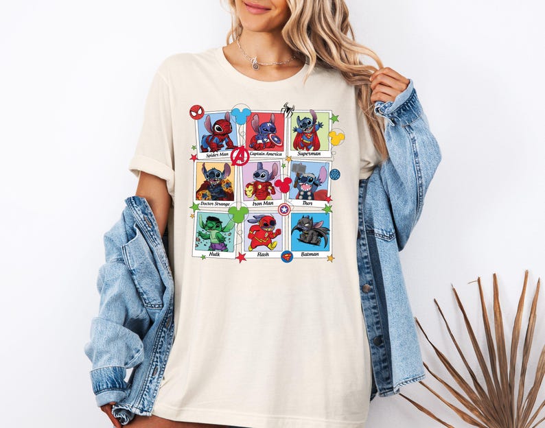 a woman wearing a t - shirt that has pictures of cartoon characters on it