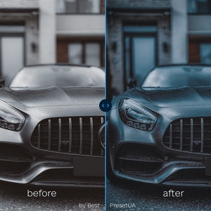 May include: A close-up of a gray car with a black grille and headlights. The car is wet from rain and the background is blurred.