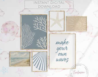 May include: A collection of framed wall art with a coastal theme. The art includes images of coral, a starfish, a seashell, a beach scene, and the text "make your own waves". The frames are a light wood color.