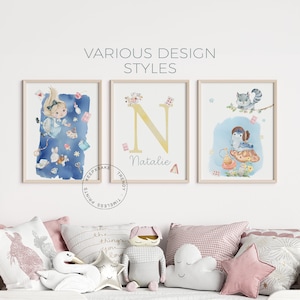 May include: Three watercolor prints featuring whimsical illustrations. The first print shows Alice from Alice in Wonderland falling down a rabbit hole. The second print features a large letter N with the name Natalie below it. The third print shows a blue bird sitting on a mushroom with a cat in the background.