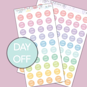 May include: Three sheets of colorful round stickers with the text "DAY OFF" in white. The stickers are in shades of pink, blue, green, and yellow.
