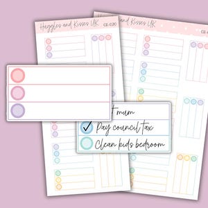 May include: A collection of planner stickers with pastel color accents. The stickers include checklists, boxes, and the text "Pay council tax" and "Clean kids bedroom". The brand name "Huggles and Kisses UK" is visible.