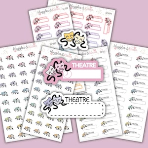 May include: A selection of sticker sheets with a theatre theme. The stickers feature drama masks and the word "THEATRE" in various designs and colours, including pink, purple, and yellow. The stickers are arranged on a light pink background.