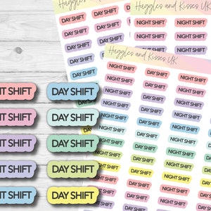 May include: A sheet of colourful stickers with the words "Day Shift" and "Night Shift" printed on them. The stickers are in various pastel colours and have rounded edges.
