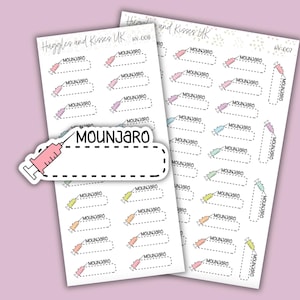 May include: Two sheets of stickers with a medical theme. Each sticker features a syringe graphic and the word "MOUNJARO". The stickers are in various pastel colors, including pink, blue, and yellow. The brand name "Huggles and Kisses UK" is printed at the top.