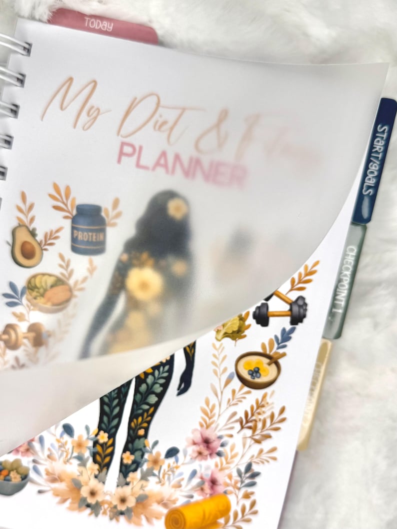 May include: A spiral-bound planner with the title "My Diet & Fitness Planner" in a script font. The pages feature illustrations of healthy foods, exercise equipment, and a silhouette of a person. Tabs are labeled "Today" and "Start/Goals".