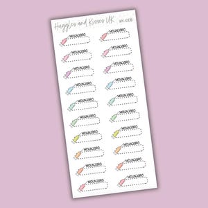 May include: A sheet of stickers with a light purple background. Each sticker features a syringe illustration in various pastel colors, with the text "MOUNJ3RO" and a dotted line for cutting. The top of the sheet reads "Huggles and Kisses UK".