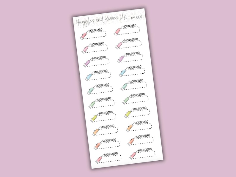 May include: A sheet of stickers with a light purple background. Each sticker features a syringe illustration in various pastel colors, with the text "MOUNJ3RO" and a dotted line for cutting. The top of the sheet reads "Huggles and Kisses UK".
