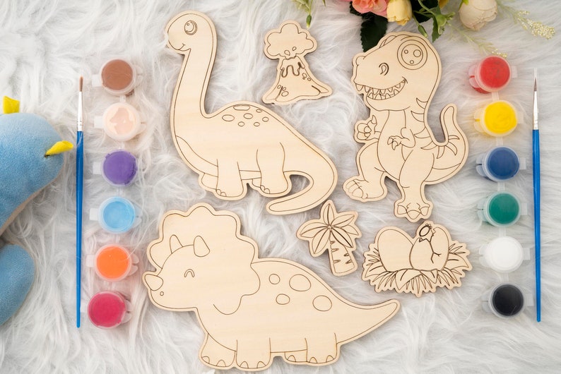 May include: Wooden dinosaur cutouts for painting, including a Brontosaurus, T-Rex, and Triceratops. Paint pots in various colors and paintbrushes are included. A fun craft activity for kids.
