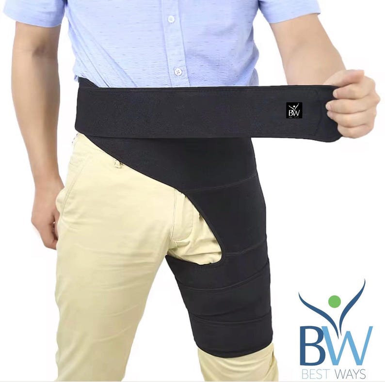 May include: Black hip and thigh support brace. The brace wraps around the hip and thigh, with a wide band for the waist and a series of straps for the thigh. The brand logo "BW" is visible on the waist band.