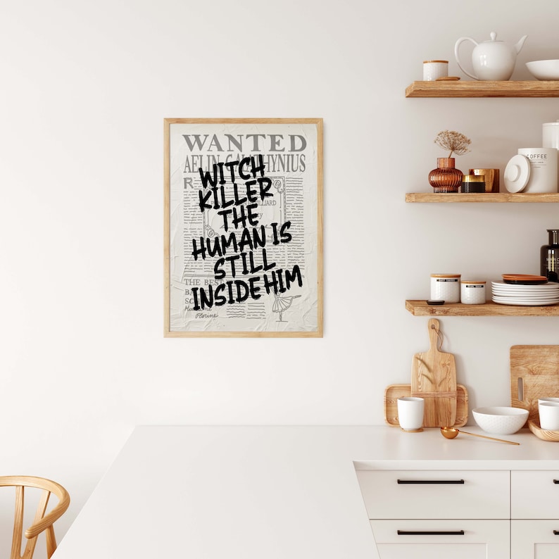 May include: A black and white printable poster with the text "WANTED WITCH KILLER THE HUMAN IS STILL INSIDE HIM" on a vintage newspaper background.