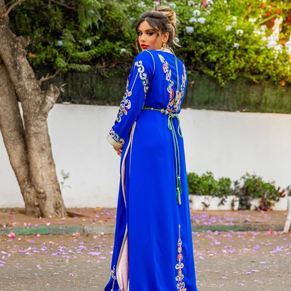 Traditional Moroccan kaftan with modern elegance blue color with white decorations