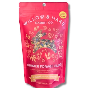 May include: A red bag of Willow & Hare Rabbit Co. Summer Forage Blend. The bag features a rabbit silhouette filled with colorful dried flowers and the text "Summer Forage Blend" with a list of ingredients. The bag is 1 oz.
