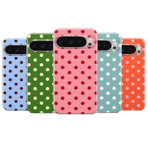 May include: Five colorful phone cases with a polka dot pattern. The cases are in various colors: light blue with brown dots, green with white dots, pink with red dots, teal with white dots, and orange with white dots.