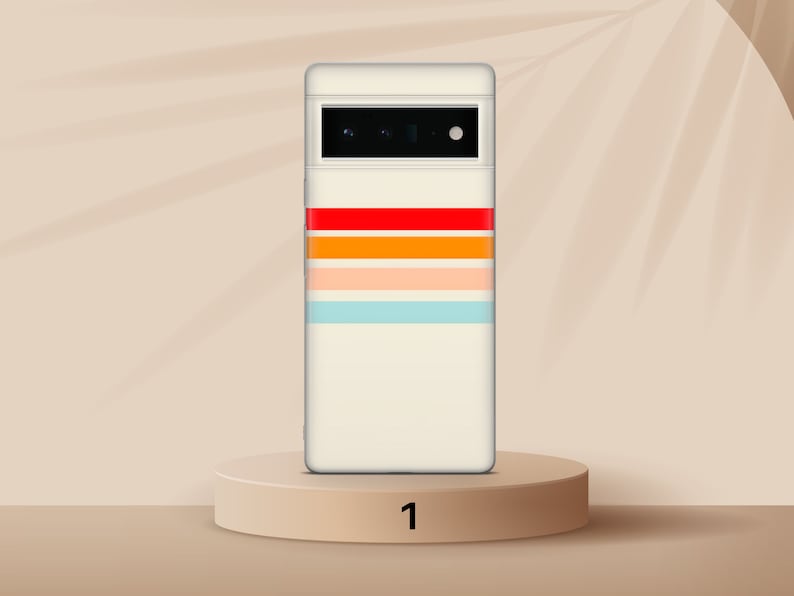 K&ouml;nnte beinhalten: Eine wei&szlig;e Handyh&uuml;lle mit einem bunten Streifenmuster. Die H&uuml;lle hat einen Ausschnitt f&uuml;r die Kamera und einen wei&szlig;en Hintergrund mit roten, orangen, gelben, rosa und blauen Streifen.