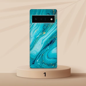 May include: A blue and gold marble phone case with a black camera lens.
