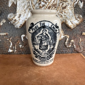 May include: A rustic wooden sign with the text "Welcome to our home" in white lettering. The sign features a distressed finish and a simple, inviting design, perfect for a front porch or entryway.