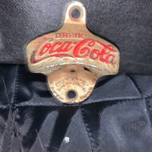 Vintage Coca-Cola StarrCast Metal stationary wall mount bottle opener