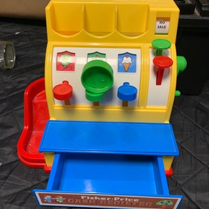 Vintage fisher price cash register with one coin