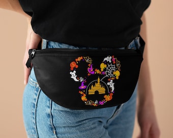 May include: Black fanny pack with a Halloween-themed Mickey Mouse design. The design features a Mickey Mouse head silhouette with a castle inside and surrounded by Halloween icons like ghosts, pumpkins, candy corn, and bats.