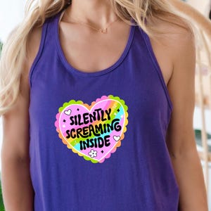 A racerback tank top with the phrase "Silently Screaming Inside" printed in bold, perfect for introverts and anyone navigating life with sarcasm and dry humor.