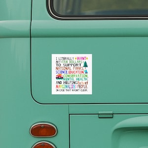 A bold activist car magnet with a message advocating for tax dollars to support education, conservation, mental health, and marginalized communities.
