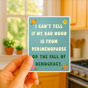 A humorous yet bold political sticker combining perimenopause humor with a statement on the fall of democracy, designed for laptops, cars, and more.