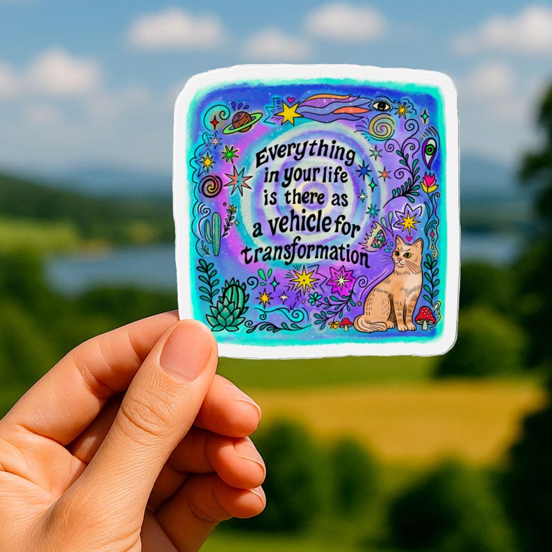 Cosmic cat sticker with celestial art and inspirational quote for self-growth