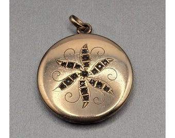 Medallón antiguo CH Allen & Co de estilo eduardiano chapado en oro con diseño de molinillo y estrella. LEER