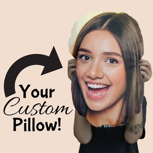 May include: A custom pillow with a smiling woman's face printed on it. The pillow is yellow and the woman is wearing a black shirt. The text "Your Custom Pillow!" is written in black on a white background.