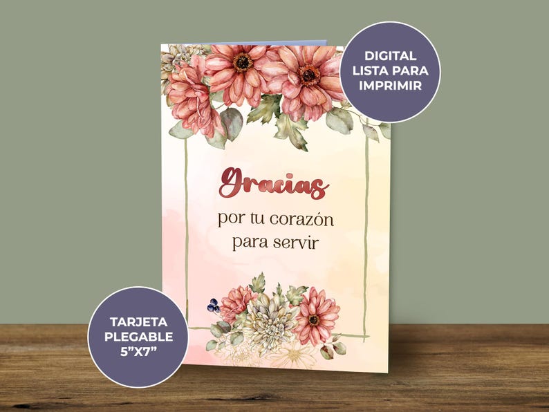 May include: A printable thank you card with a floral design. The card features pink and white flowers with green leaves. The text on the card reads "Gracias por tu coraz&oacute;n para servir".