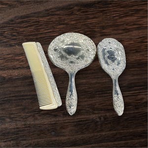 3 Piece Silver Plated Vanity Set,  Dresser Mirror, Brush, Comb Set.