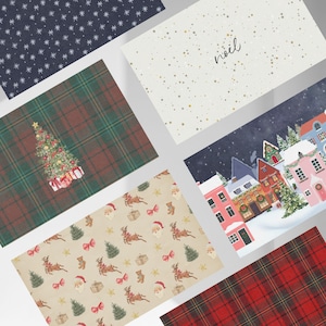 May include: A set of six different Christmas wrapping paper designs. The designs include a plaid pattern, a pattern with a Christmas tree, a pattern with Santa Claus and reindeer, a pattern with a winter village, a pattern with stars, and a pattern with the word "noël".