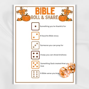 May include: A printable game sheet titled BIBLE ROLL & SHARE featuring orange pumpkins, wooden crosses with bows, and sunflowers. The list includes six numbered dice icons paired with prompts like Something you're thankful for and A favorite Bible story.